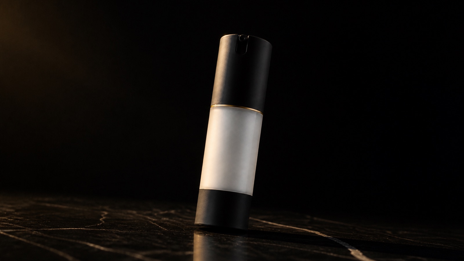Soothing Moisturizer — seen in three-quarter view, low in a wide frame — under a single warm gold light on black.