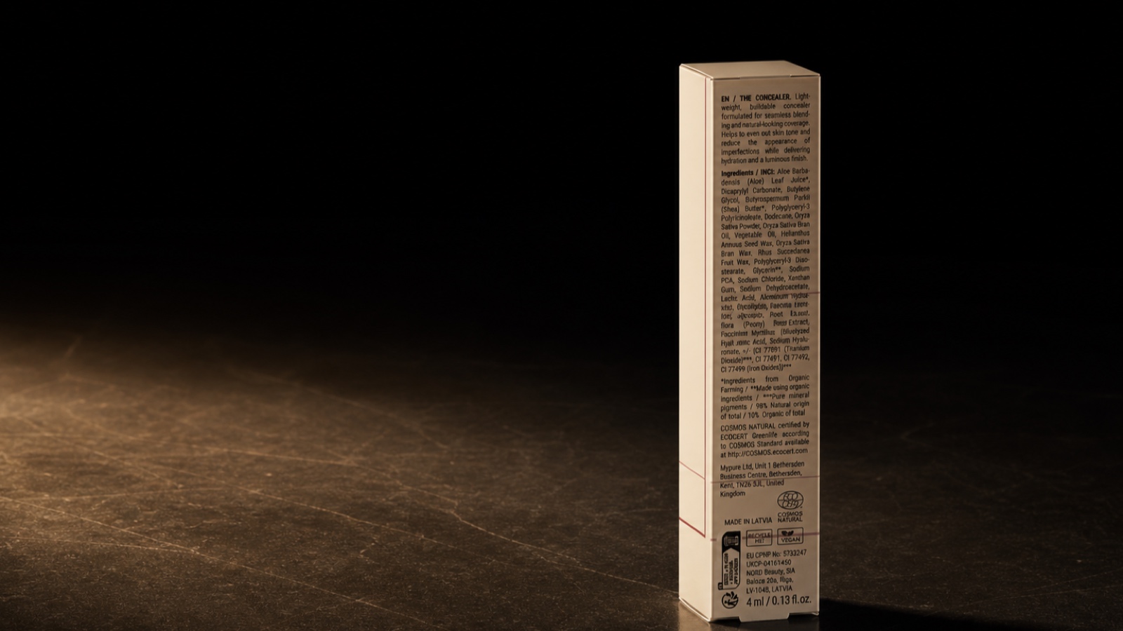 Correcting Concealer. The tube laid flat across the wide frame.