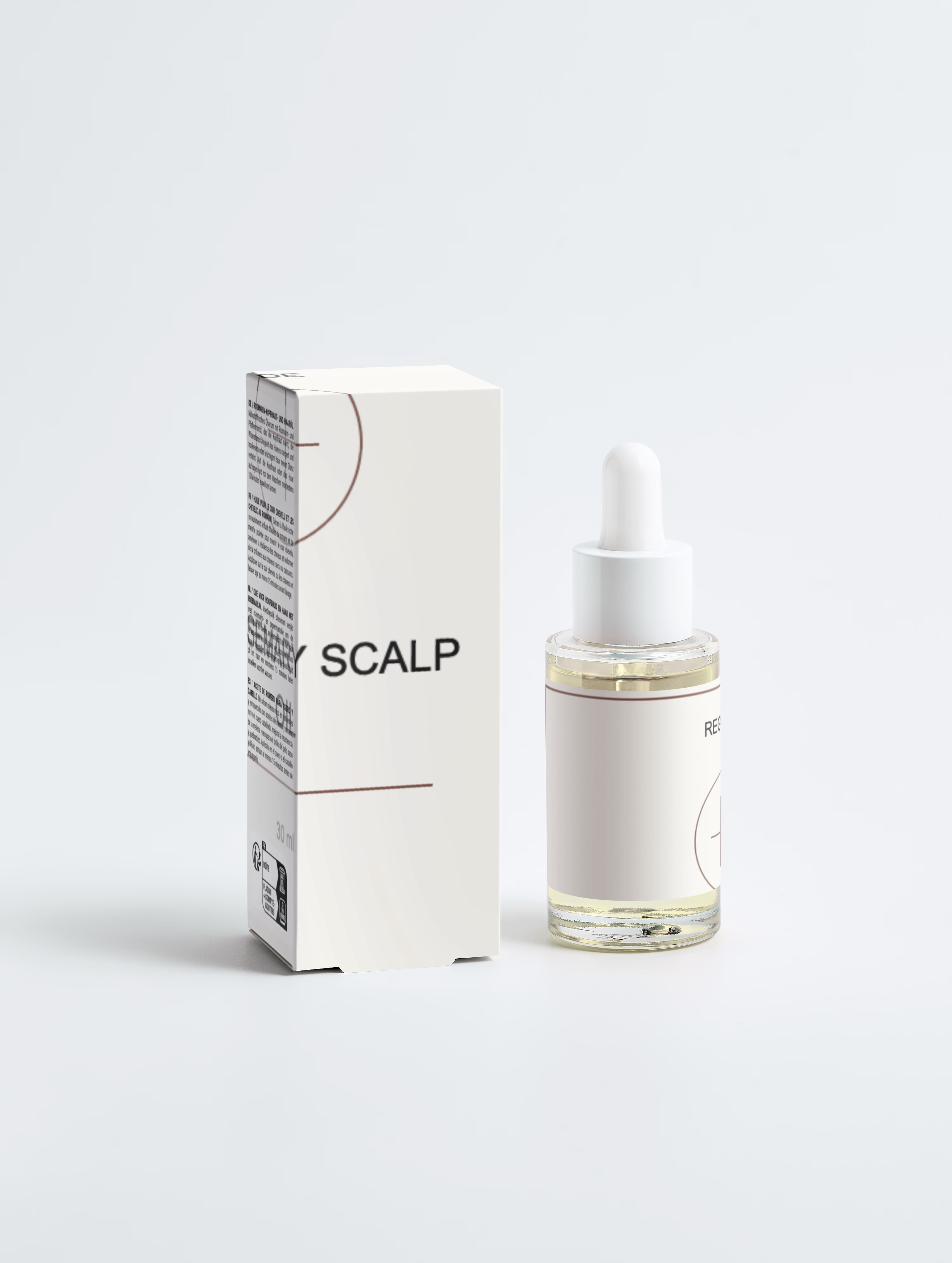 Rosemary Scalp Oil. The bottle and carton, front on.