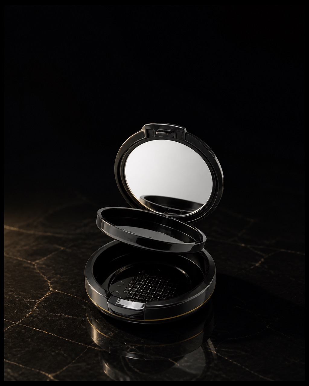 Compact Mirror — large compact mirror — standing alone against near-black under a single warm gold light.