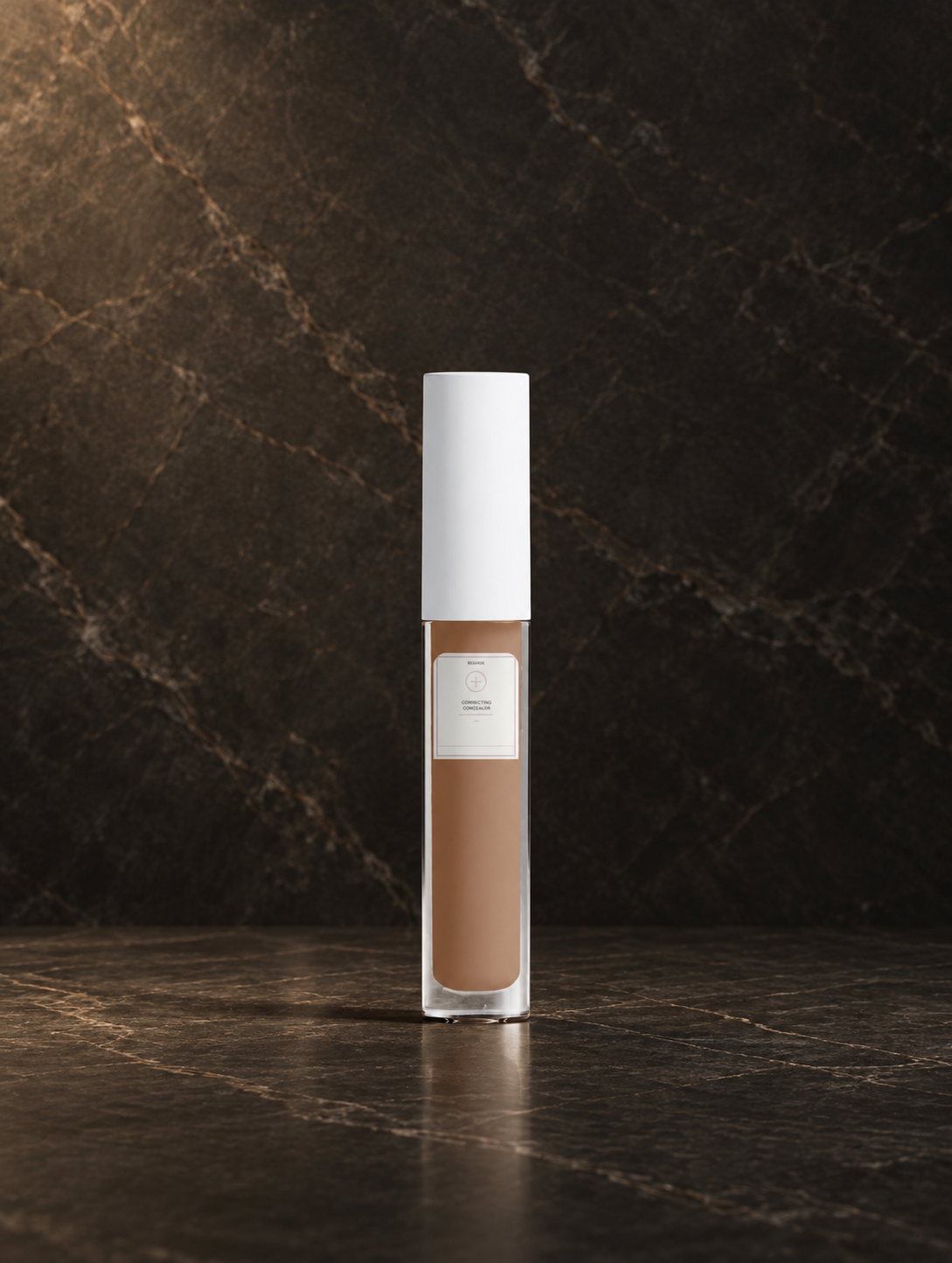 Correcting Concealer — 30 Tan Neutral, digitally styled bottle on dark stone.