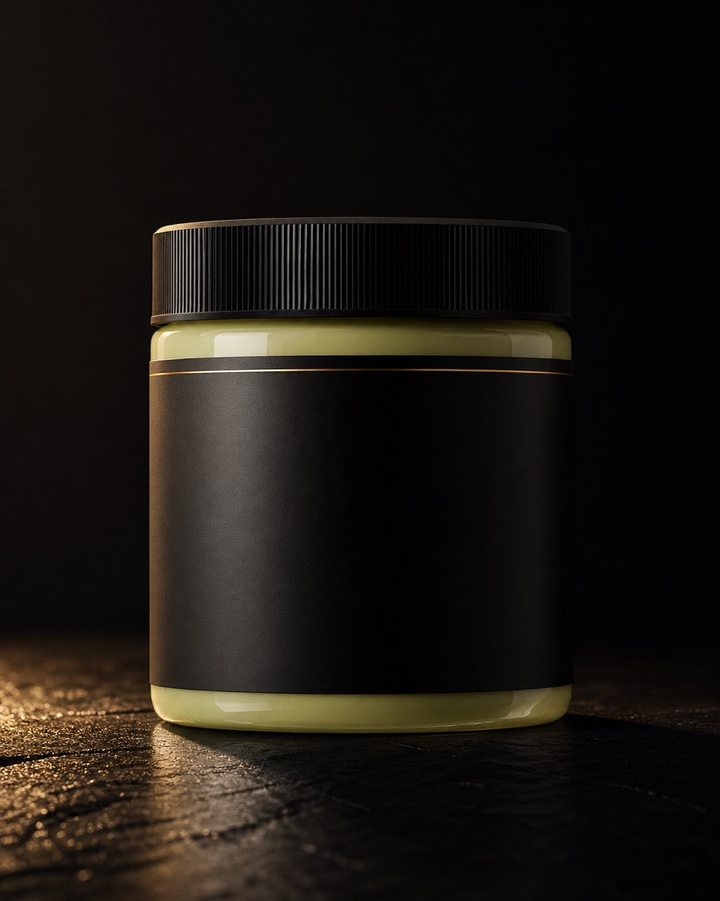 Raw Shea Butter — standing alone, complete — under a single warm gold light on black.