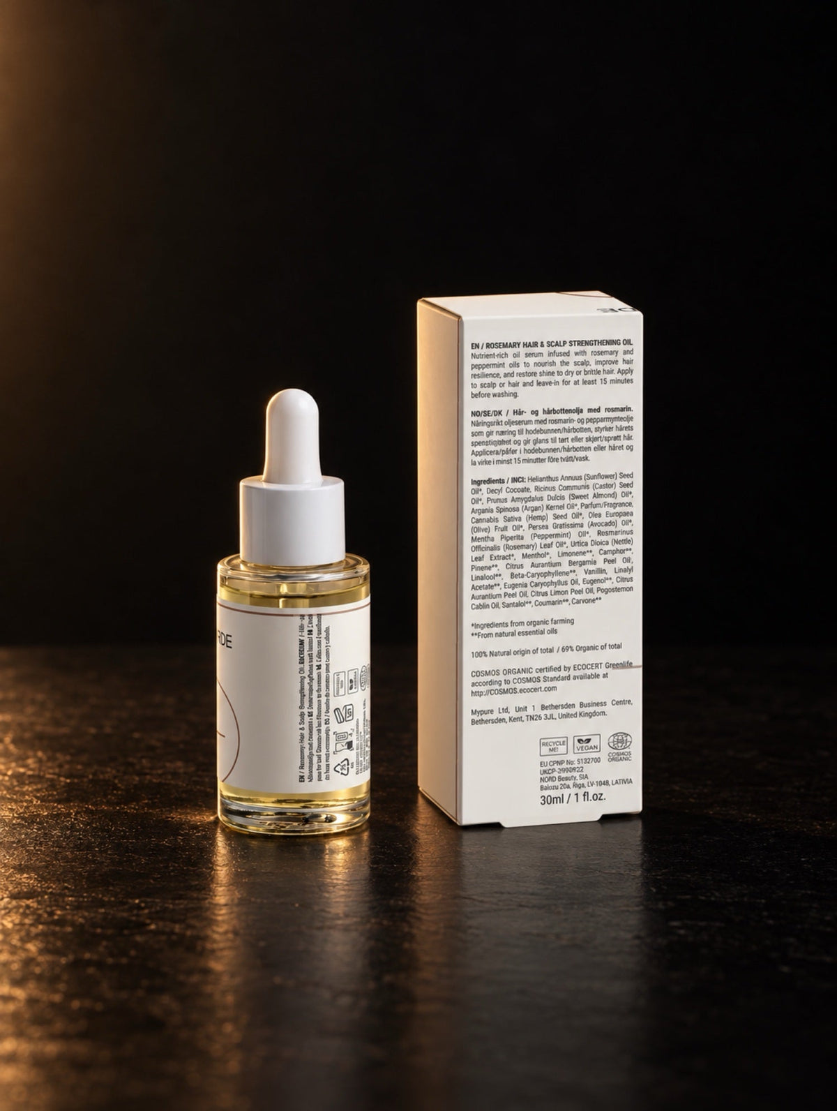 Rosemary Scalp Oil. The bottle and carton from behind.